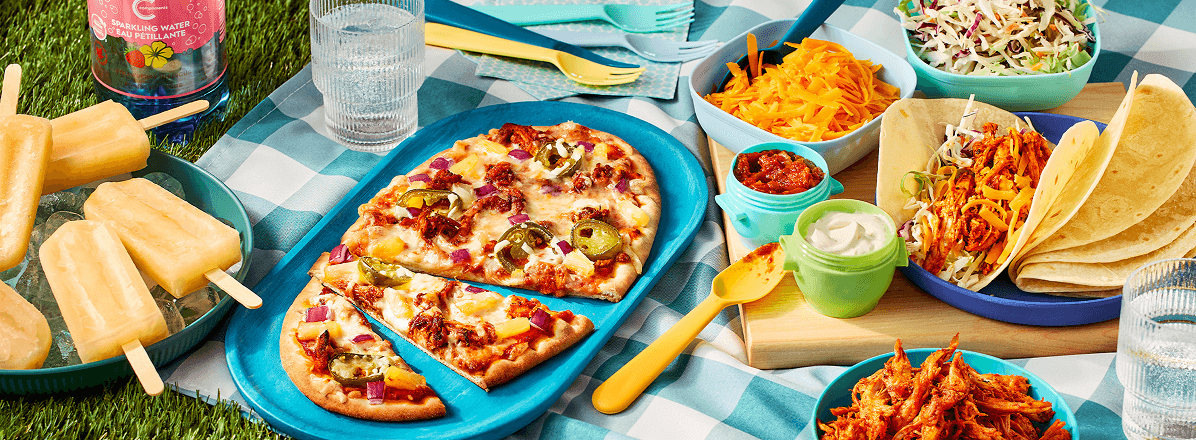 Al pastor picnic with flatbread, taco kit, pulled pork, and spicy margarita popsicles