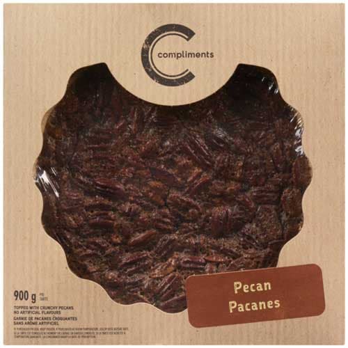 Pecan Pie with toasted pecans in holiday setting